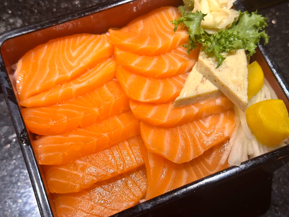 Freshly sliced salmon sashimi at Mido